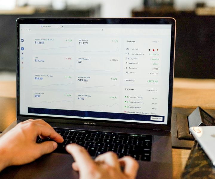 Laptop screen with a financial dashboard loaded