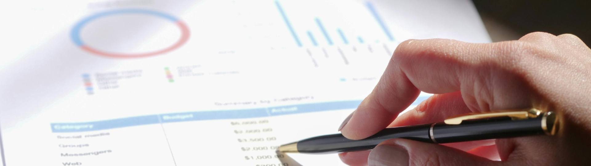 An Avon accountant going over financial records