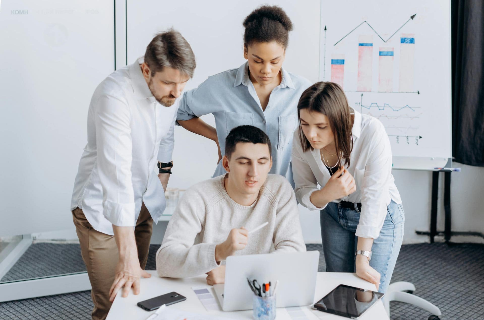 Business owners meeting at a laptop